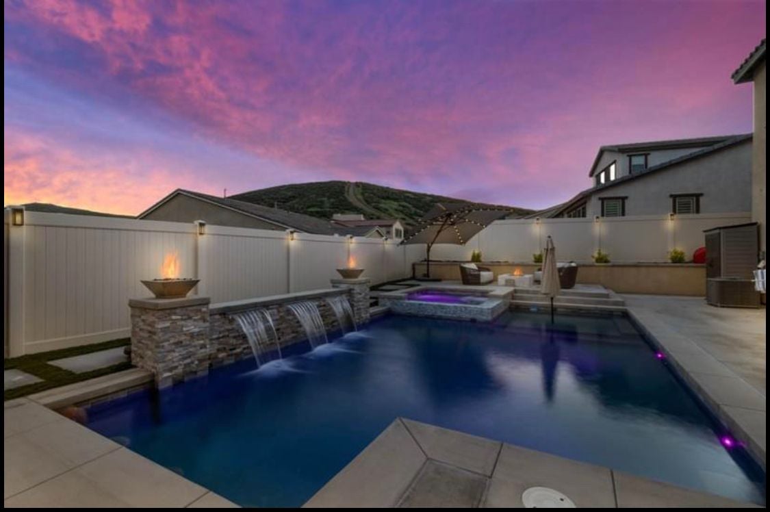 pool with fire bowls
