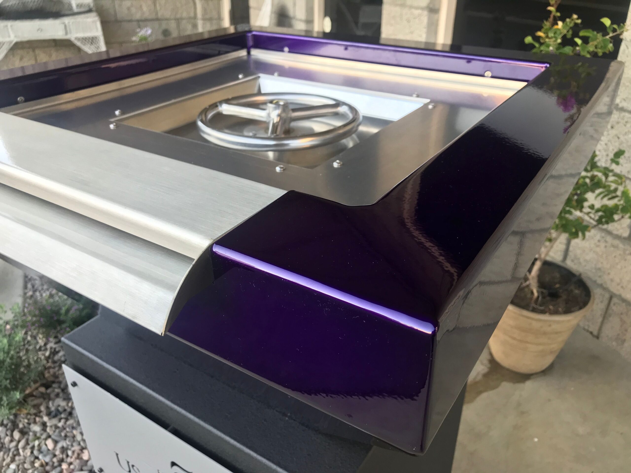 Purple fire and water bowl for pools by USA Fire Bowls